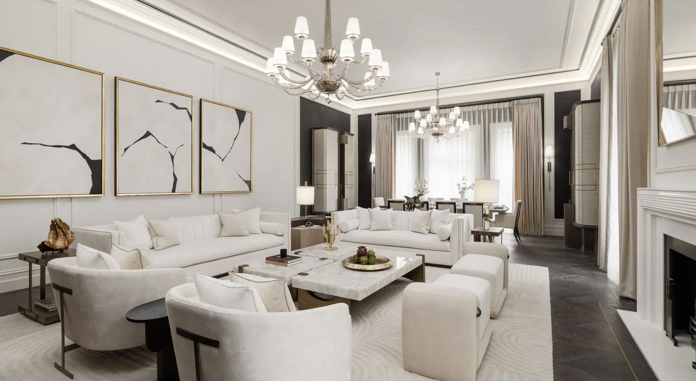 Drawing room of a completed Belgravia apartment, with panelled walls, chandeliers and concealed building services integrated into the ceiling