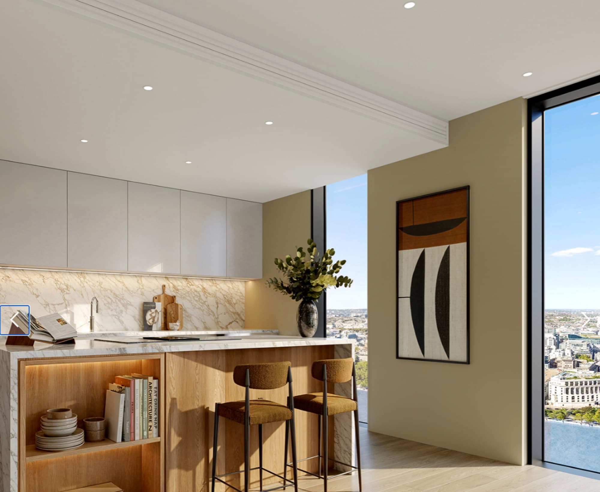 Open-plan kitchen in a Central London apartment with marble island, discreet ceiling lighting and skyline views through full-height glazing