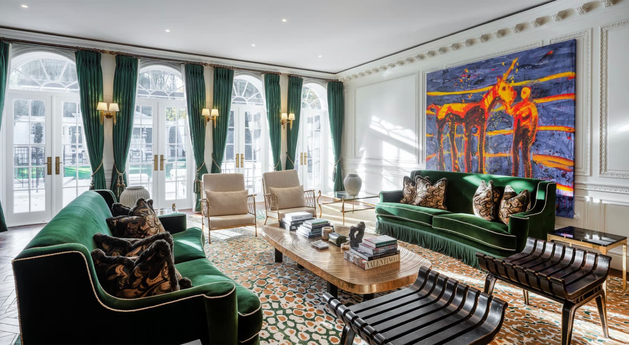 Concierge lobby of a prime London residence with marble floor and calm, uncluttered ceiling